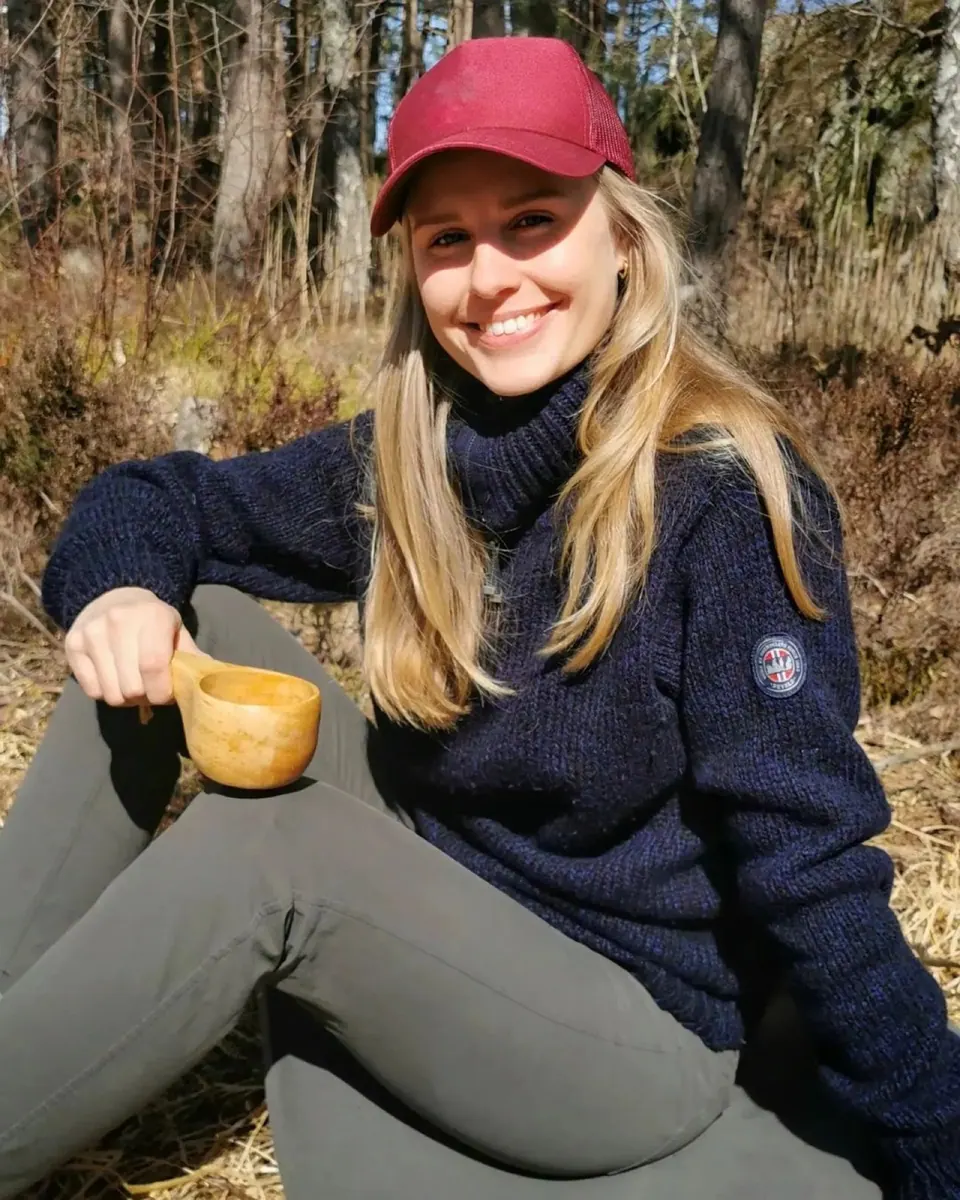 Creator in a cap photographed in a forest